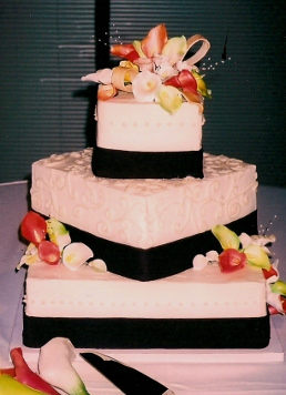 3 Tier  Ivory Buttercream Square
w/ Fondant Ribbon & Sugar Calla Lilies